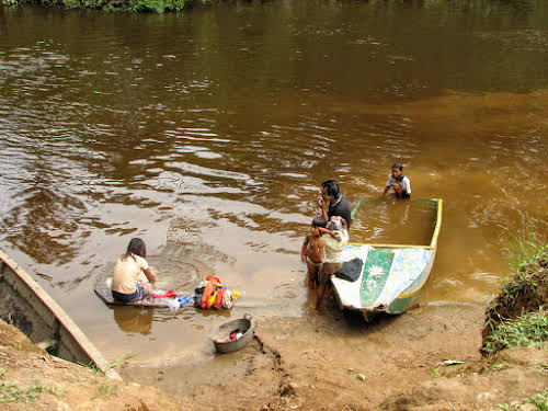 Washing clothes in the river