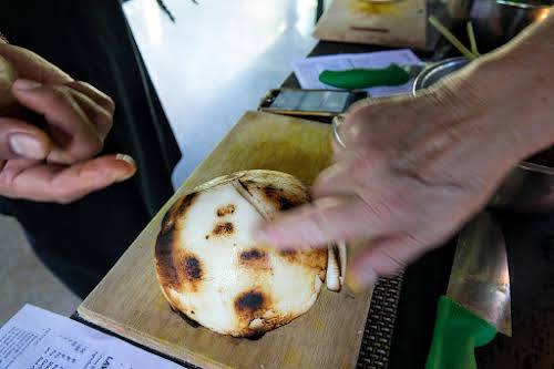 Indonesia. Bali Cooking Class. Roasted coconut for maximum flavor