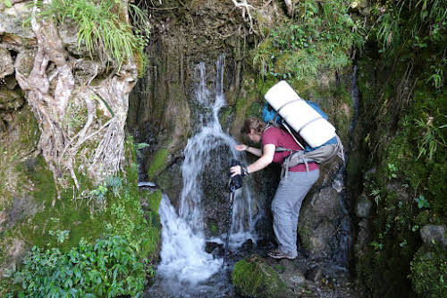 Indonesia. A Guide to Baliem Valley Trekking. One of the rare sources of water on the Baliem Valley Trek