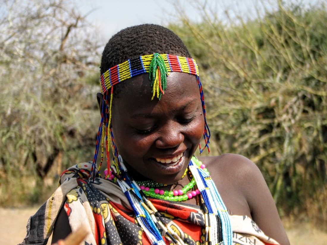 Hadzabe woman with colorful beads