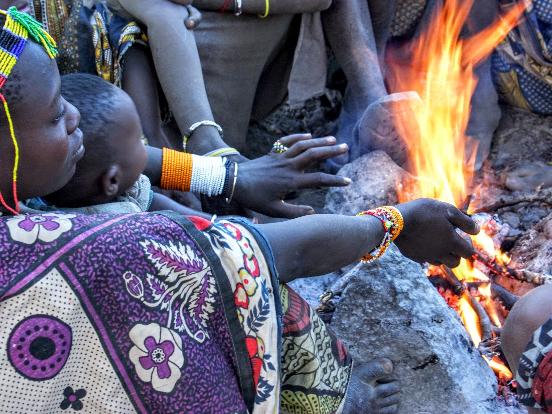 Hadzabe women gathered by the fire